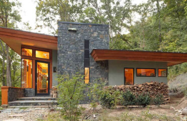 Twilight shot of Frank Lloyd Wright inspired custom home by Sineath Construction