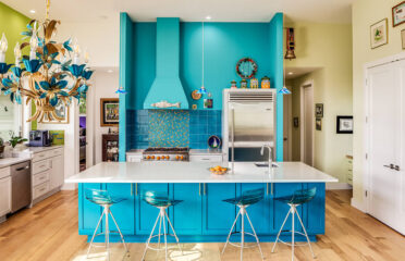 Turquoise chef's kitchen with island
