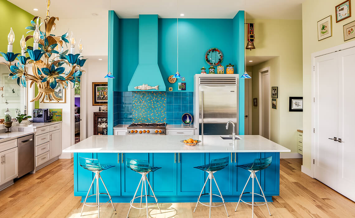 Turquoise chef's kitchen with island