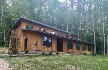 Custom home in woods front