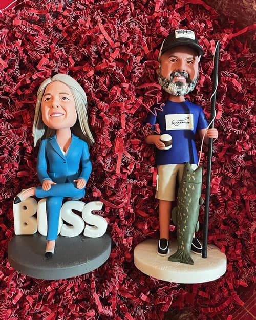 Bobble heads of Sineath's fearless leaders, Brian and Allyson